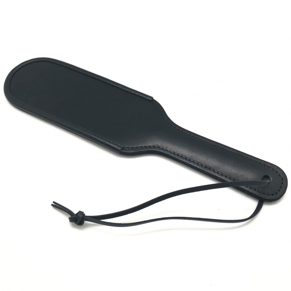 Leather paddle with curved edges 31 x 7 cm